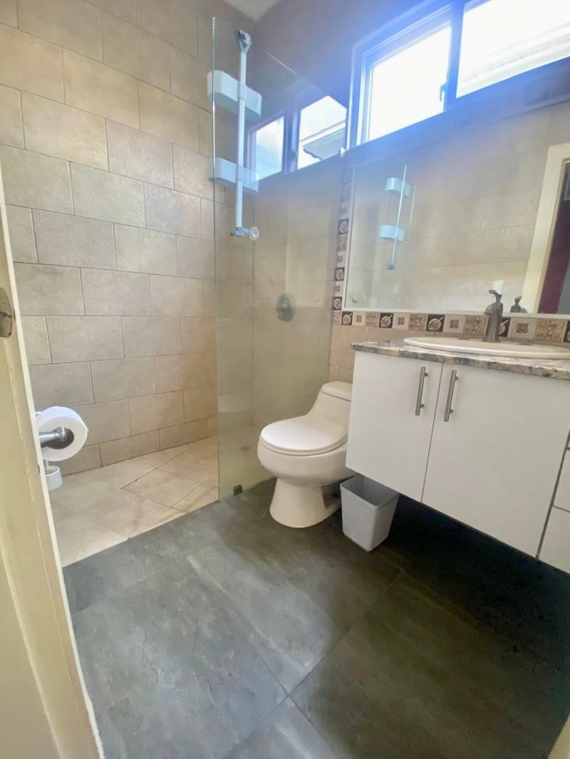 ON THE COAST, IN A GATED COMMUNITY: NEW SUITE FOR RENT WITH PRIVATE PATIO — photo 8
