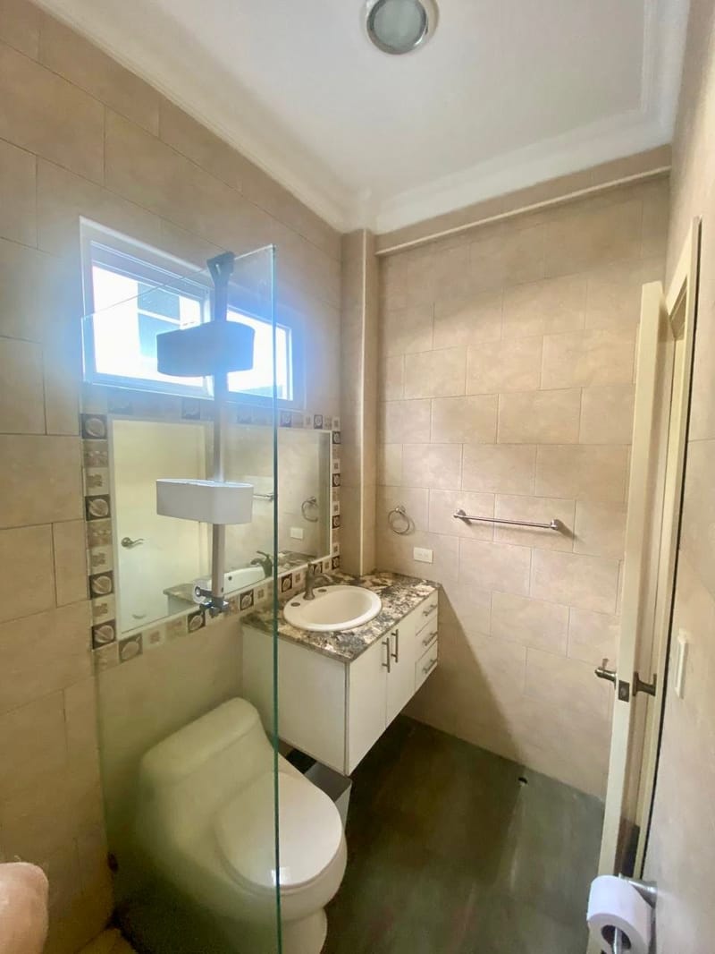 ON THE COAST, IN A GATED COMMUNITY: NEW SUITE FOR RENT WITH PRIVATE PATIO — photo 9
