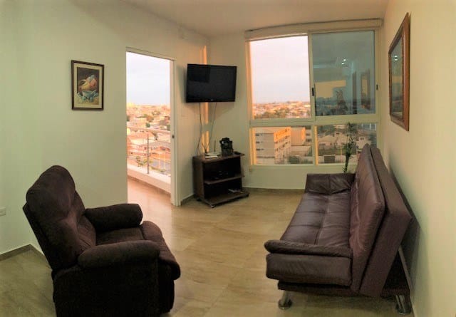 SAN LORENZO: AMPLIA SUITE CON BALCON Y PISCINA A 1 CUADRA DEL MAR — foto 5